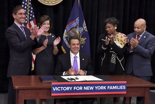 Cuomo with Andrea Stewart-Cousins, right, in 2015
